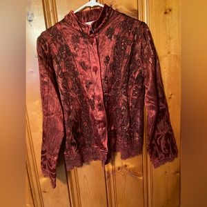 Says Size large but fits like a medium Beautiful Flashback womens top has sequin